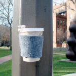 Magnetic Coffee Cozy Lets You Hang Your Cup On A Street Lamp