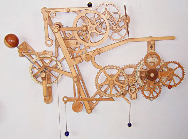 Want To Make Your Own Wicked-Looking Mechanical Wooden Clock?