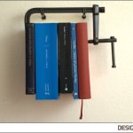 Newton Bookshelf Clamps Your Books, Hangs Them Up In The Air