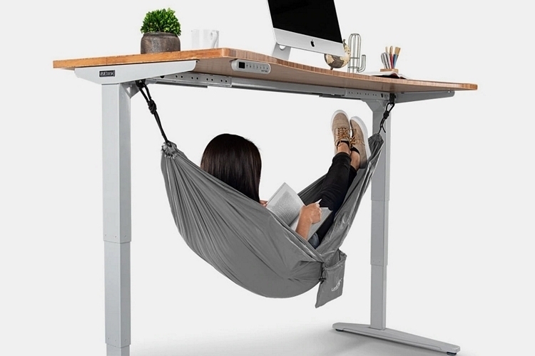 https://www.coolthings.com/wp-content/uploads/2019/09/uplift-under-desk-hammock-1.jpg