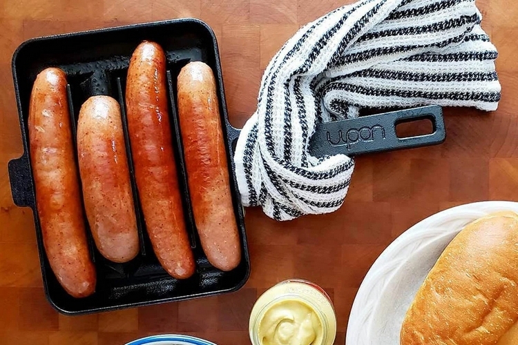 https://www.coolthings.com/wp-content/uploads/2022/05/upan-cast-iron-sausage-fry-pan-0.jpg